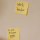 Sticky notes on a wall used to decide what to fix first in a business